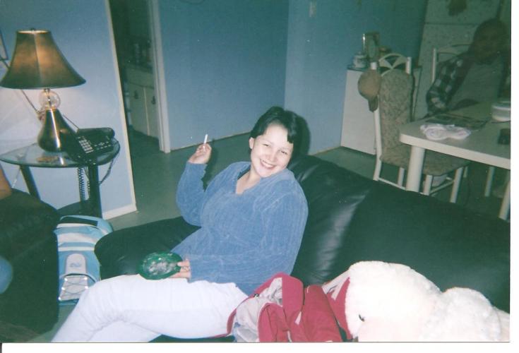 my daughter, Anita  having a cigarette in one of her many visits @ our house. i miss those times, my girl..